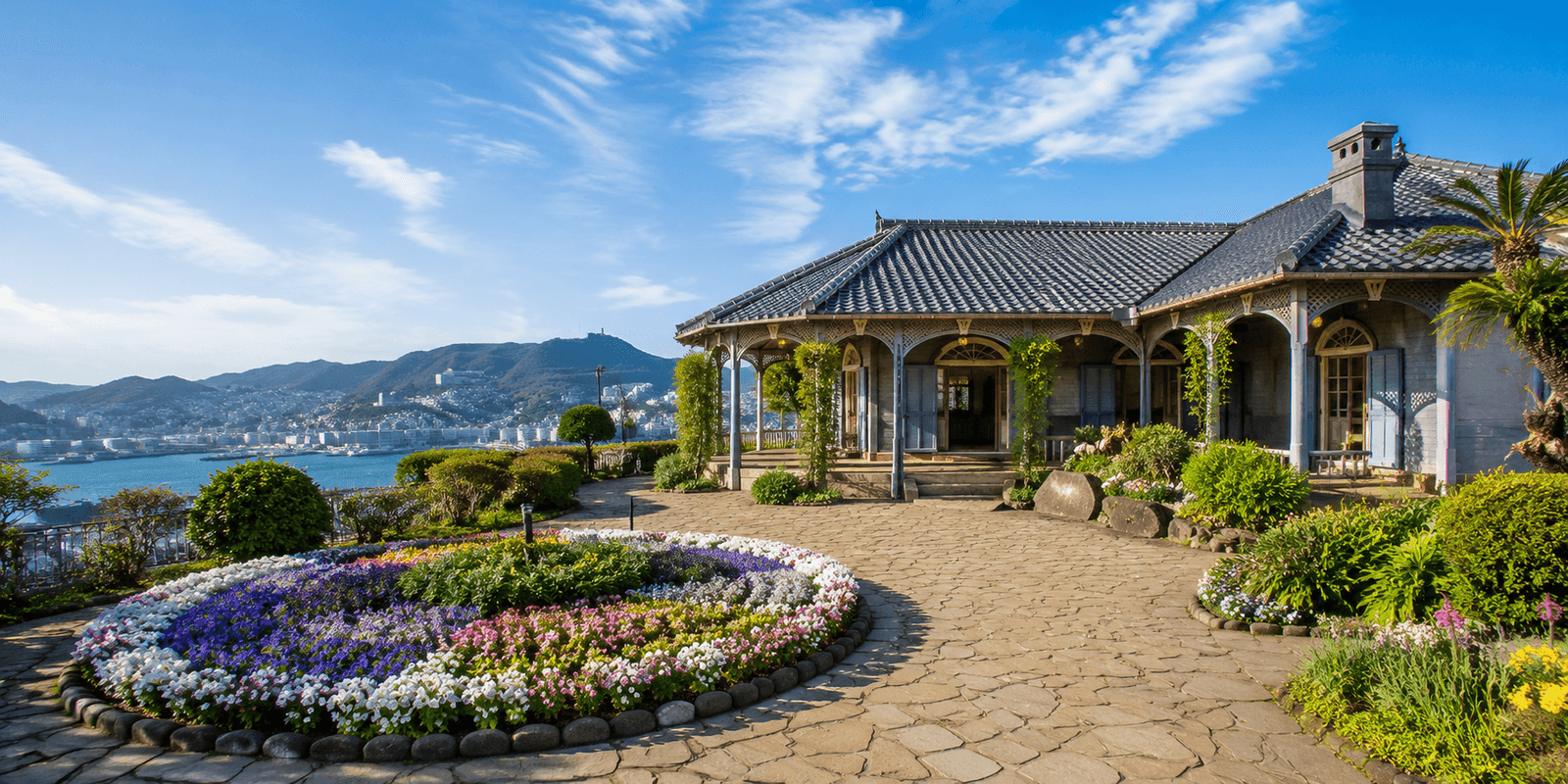 Western-style wooden residences and terraced gardens above Nagasaki harbor at Glover Garden in Minamiyamate