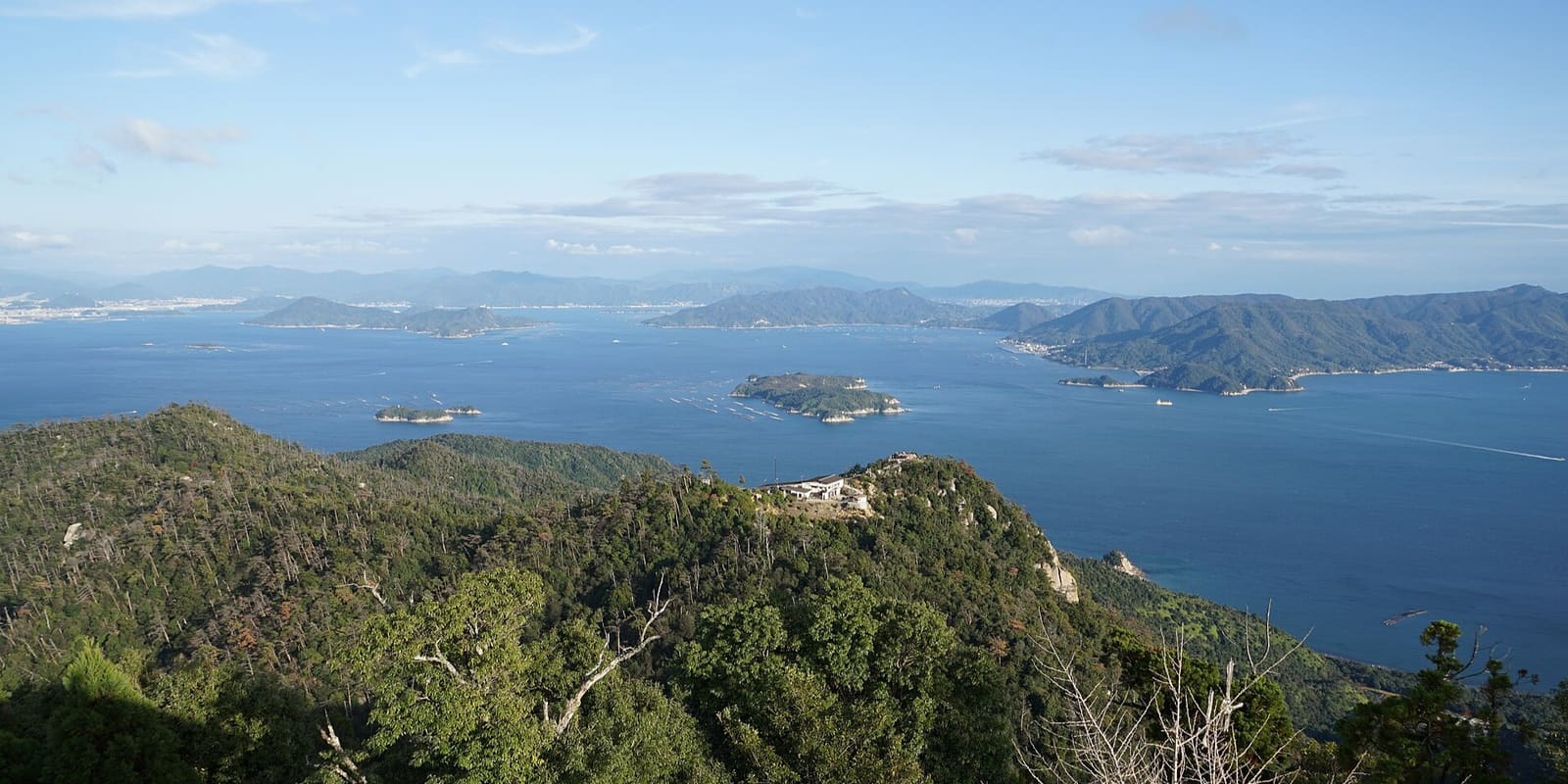 View from Mount Misen across forested Miyajima ridges and the islands of the Seto Inland Sea, Hiroshima