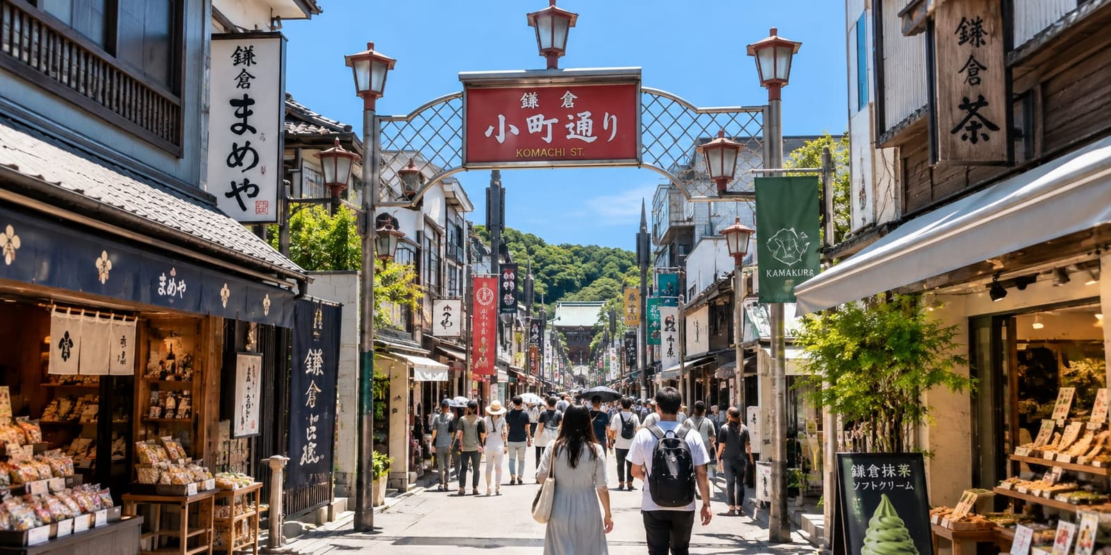 Komachi Street's narrow pedestrian shopping lane lined with shop signs and crowds of visitors near Kamakura Station