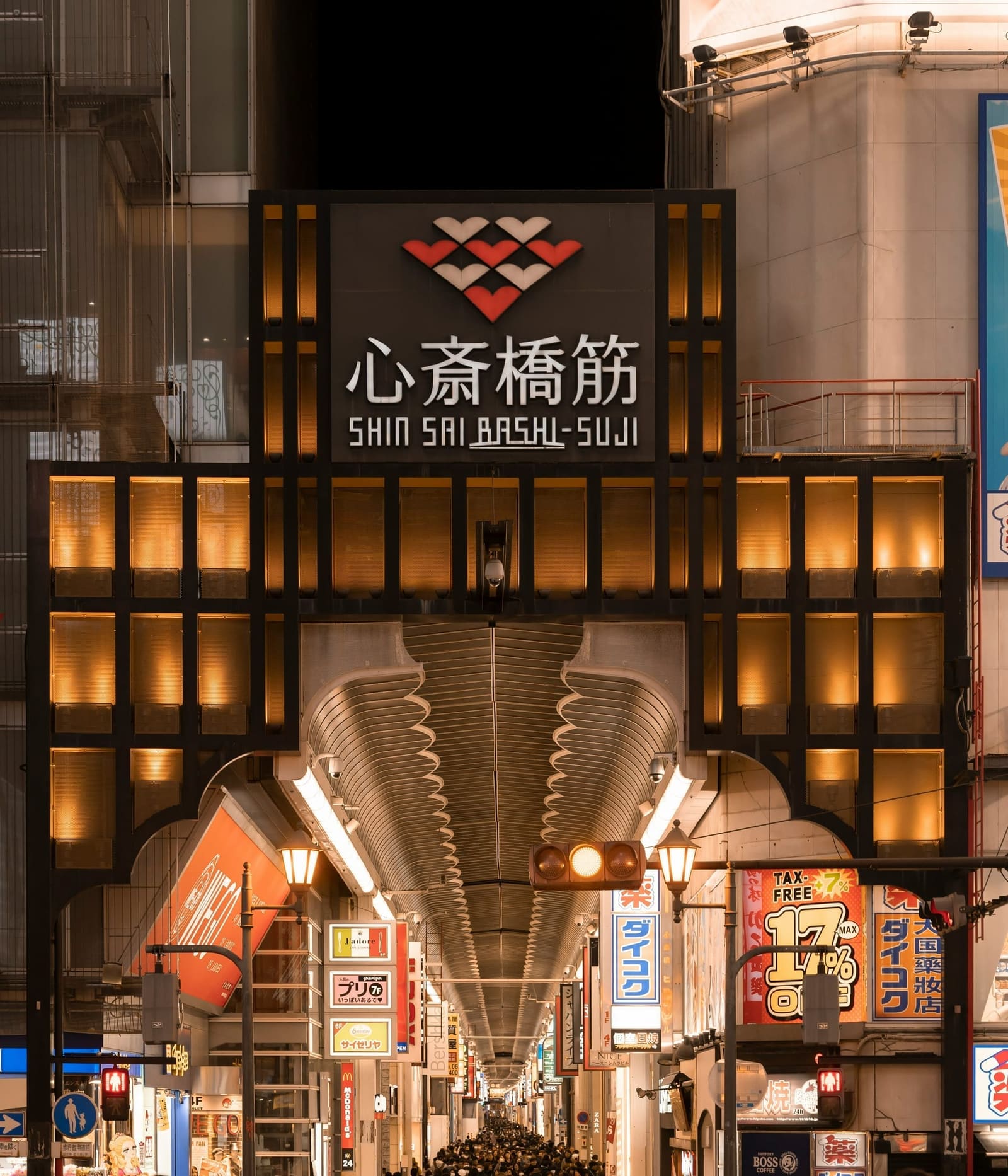 Fashion boutiques and international brands lining Shinsaibashi Shopping Street in central Osaka, Japan
