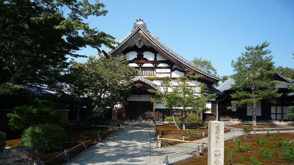 Kodai-ji's kuri, a large white-gabled wooden hall, at the end of a stone path through a moss garden with young pines